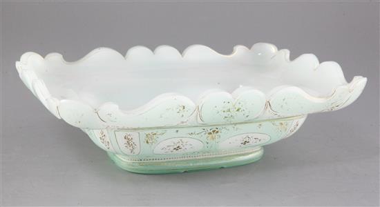 A Bohemian green tinted opaline glass dish, second half 19th century, made for Turkish market, length 33cm